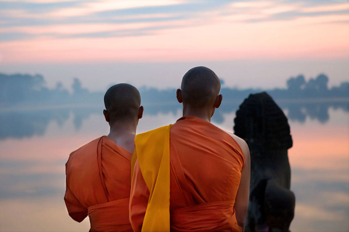 Buddhist monks at sunrise in Siem Riep