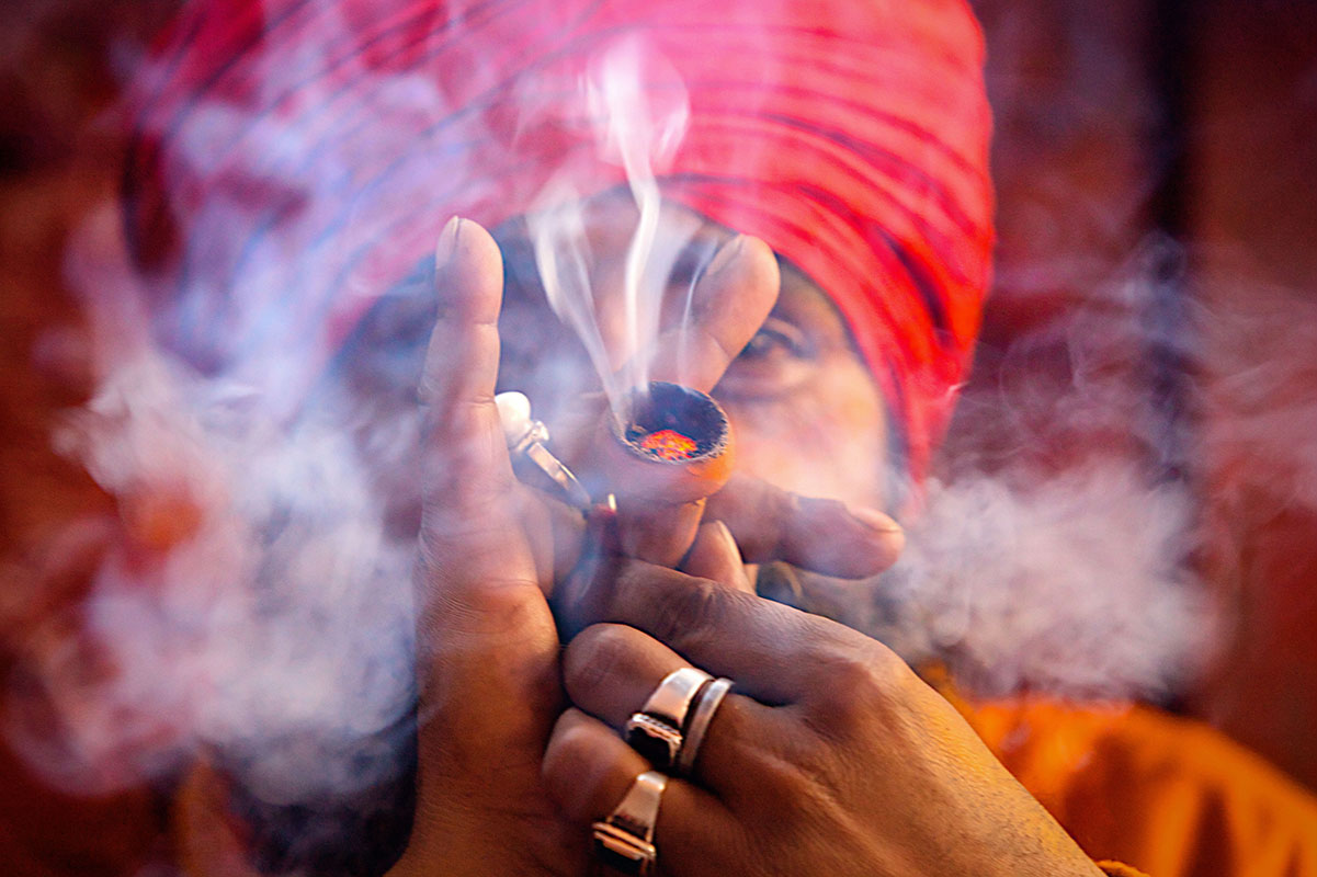 Swami smokes marijuana in Ashram