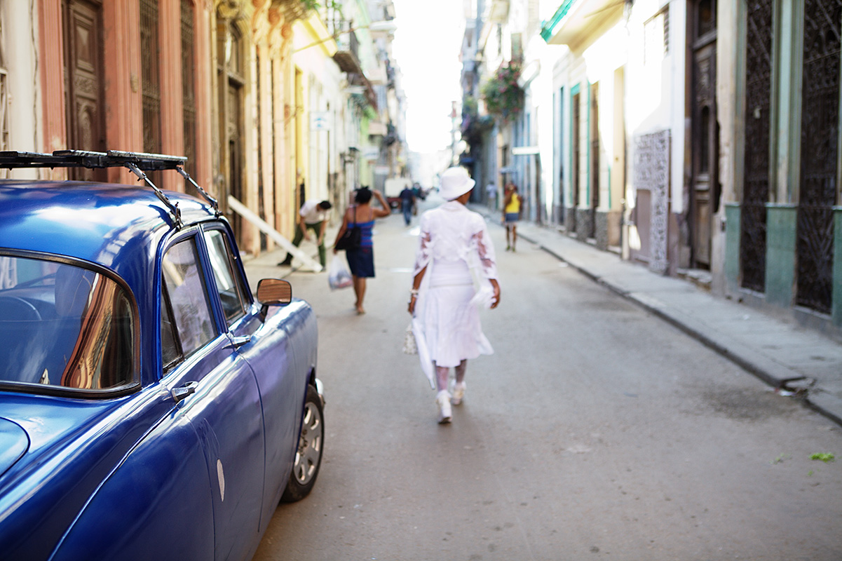 Wife of disappeared political prisoner walks the vibrant Havana street