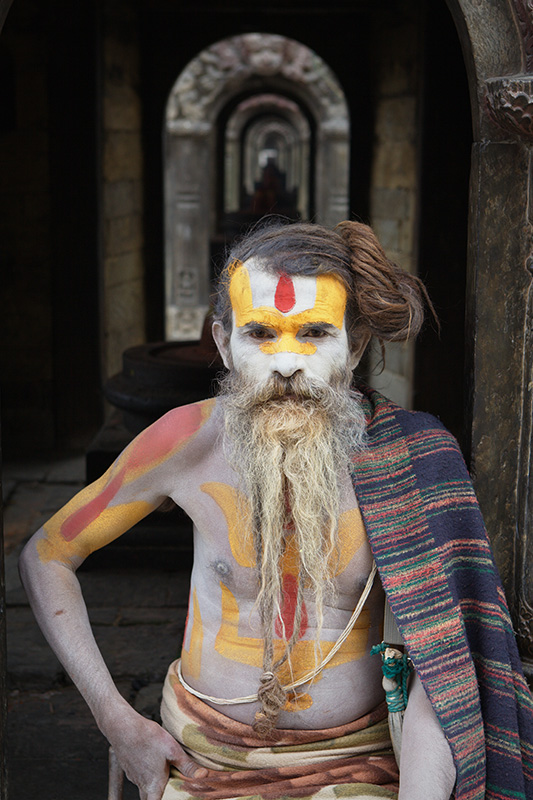 Man at pray with infinite background, sadhu project photography