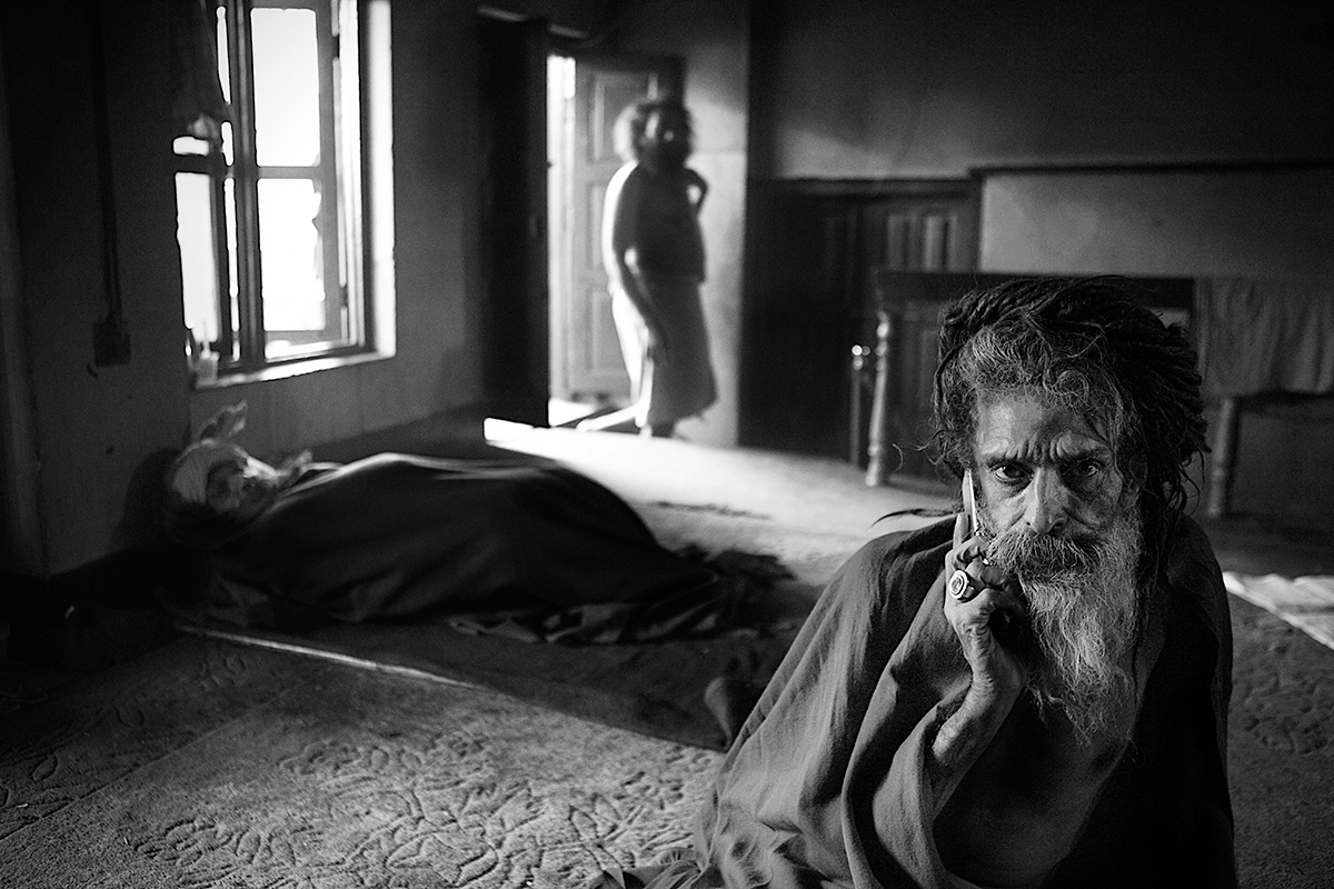 Baba talks on mobile phone, sadhu project photography