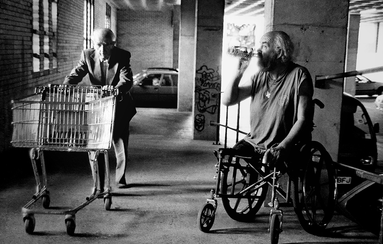 Alcoholic amputee drinks vodka in street carpark