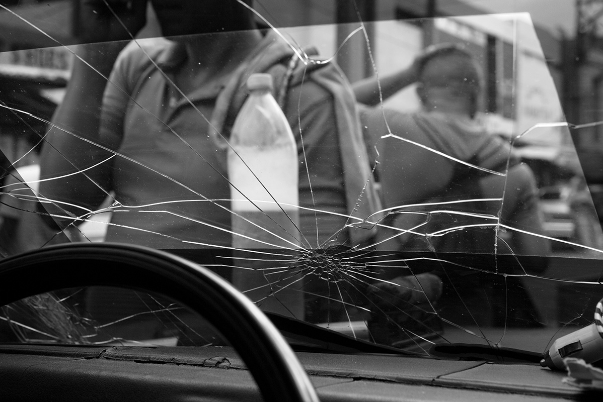 Cracked windscreen of car in Colombian Bordertown