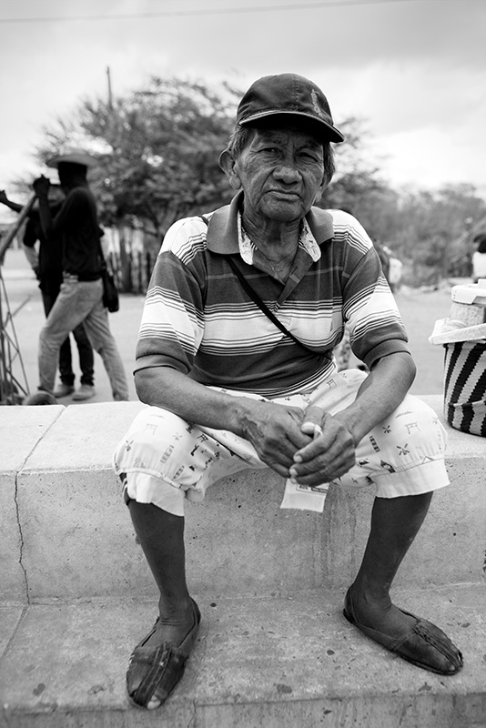 Elderly man waits for medicine on border crossing