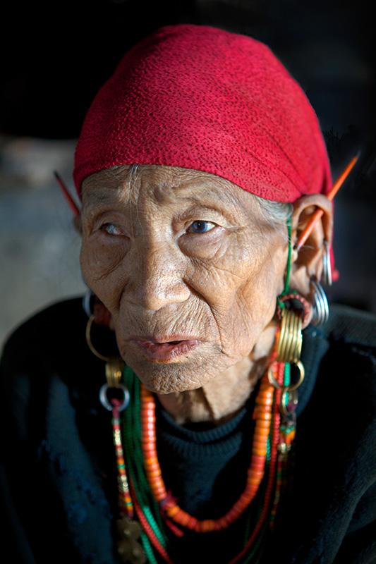 Blind lady in traditional jewellery in Longwa Village