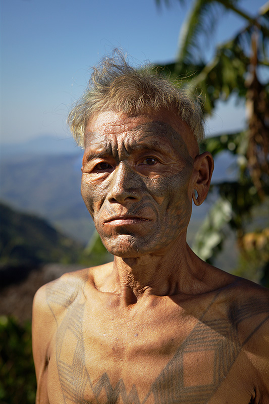 Header stares bluntly with pierced ears